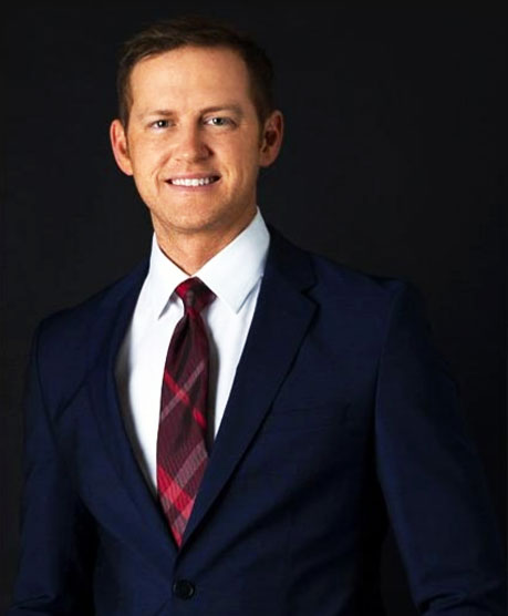 head shot of doctor in suit